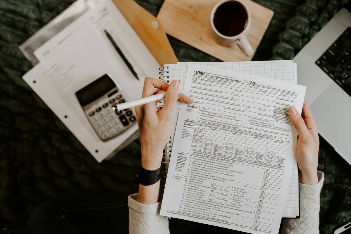 financial planning higher certificate holder leading family wealth meeting with trust documents and digital dashboard
